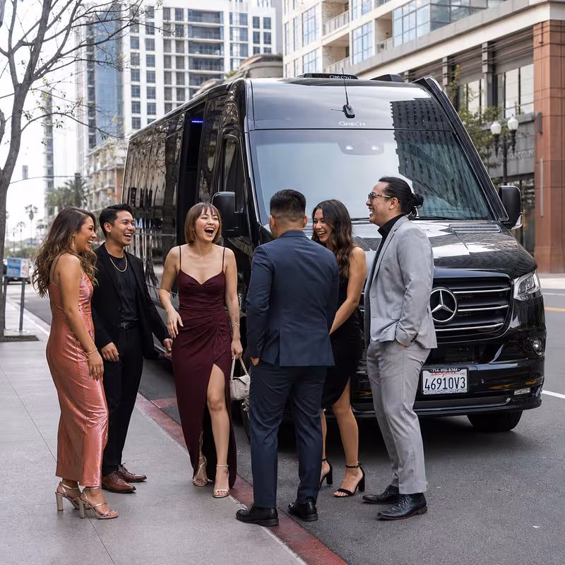 Group boarding a white charter bus for Bachelor & Bachelorette Transportation transportation in San Diego