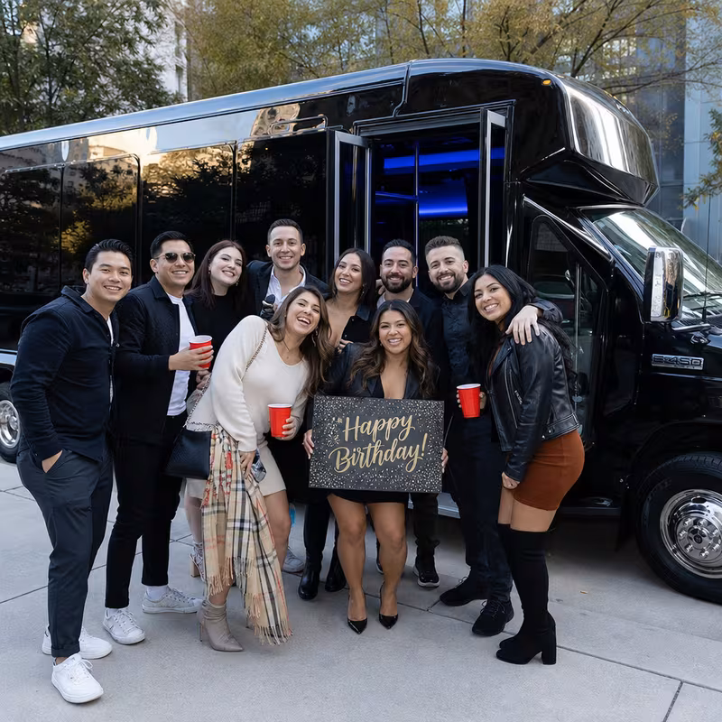 Party bus interior with wraparound leather seating and LED lighting in San Diego