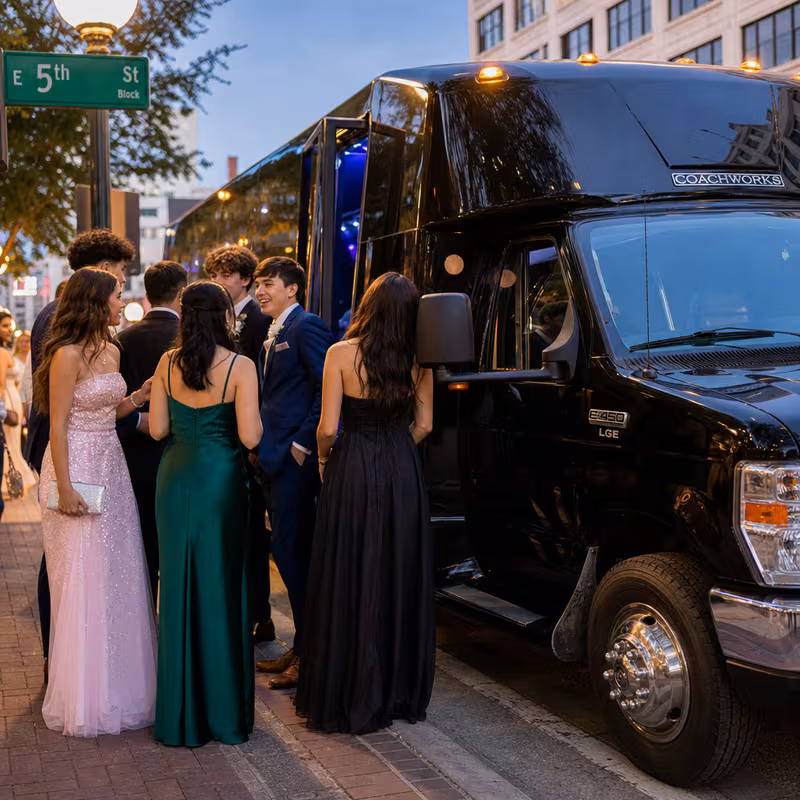 Passengers loading luggage while boarding an San Diego group shuttle