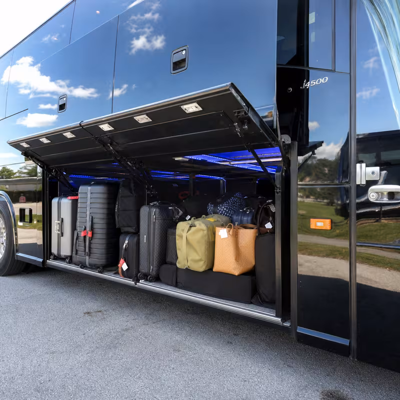 Party bus interior with wraparound leather seating and LED lighting in San Diego