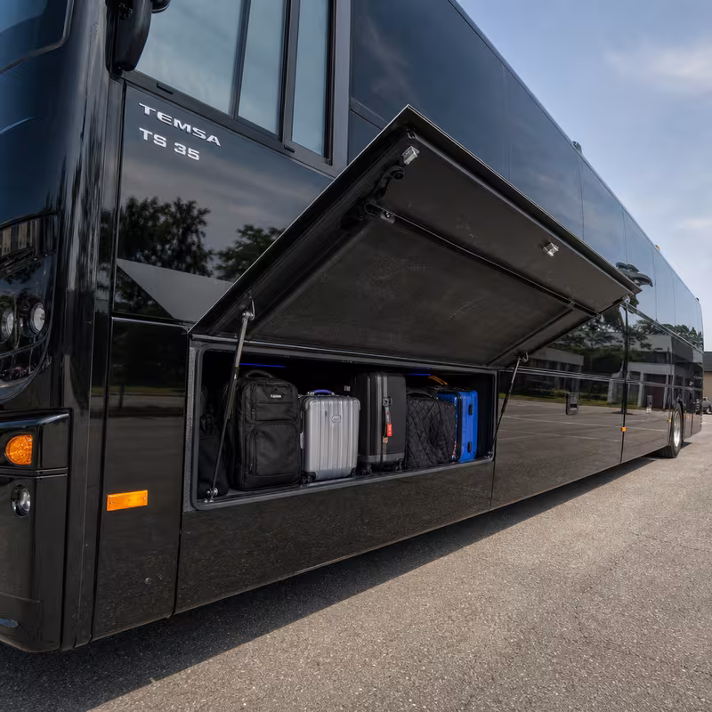 Party bus interior with wraparound leather seating and LED lighting in San Diego