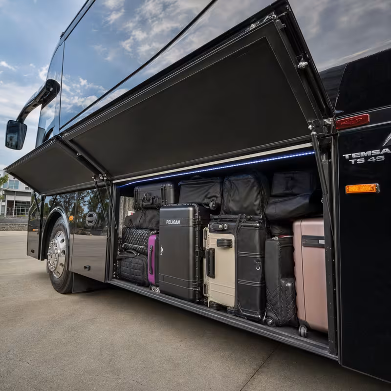 Party bus interior with wraparound leather seating and LED lighting in San Diego